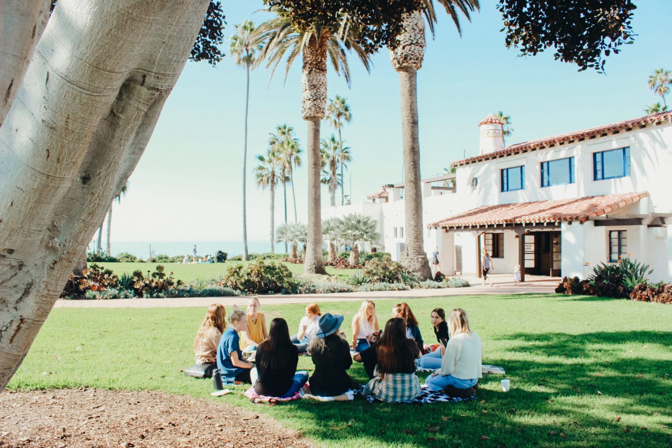 community outdoor sitting in circle